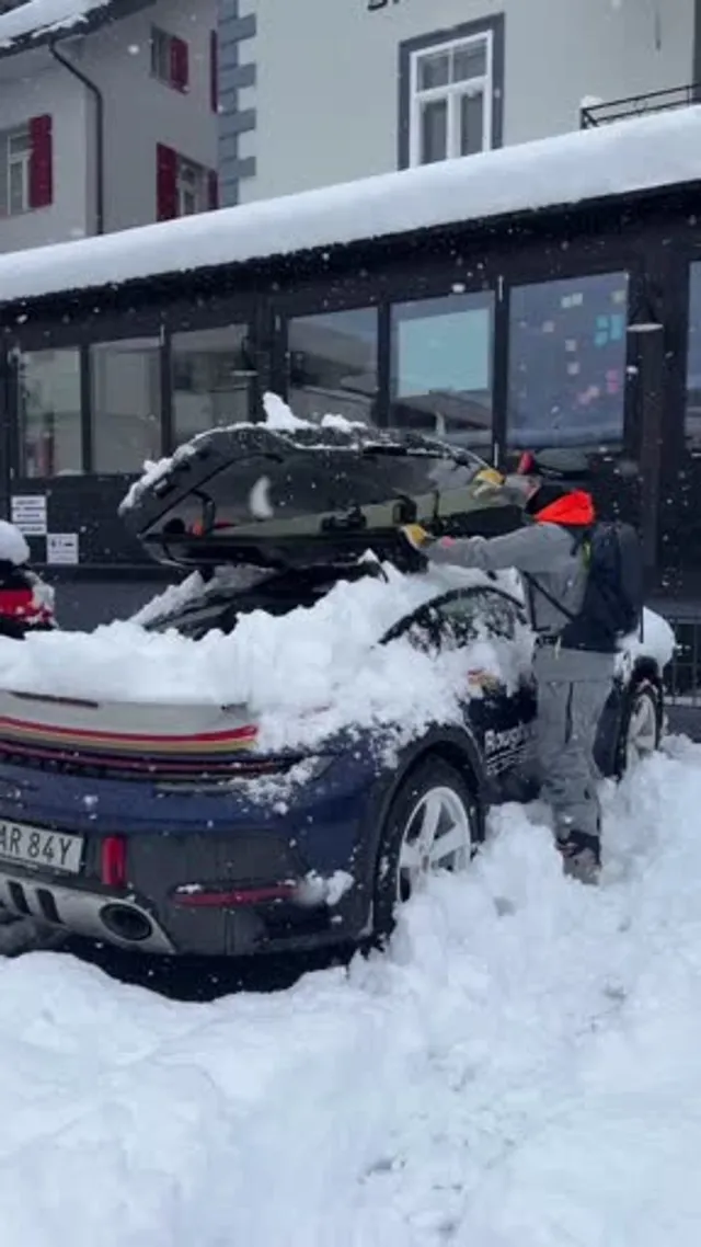Thule Motion 3 XL loaded with skis and winter gear in snowy Canadian landscape